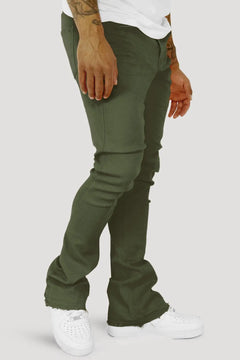 Olive stacked jeans for men with a tapered leg and folded stack at the ankle